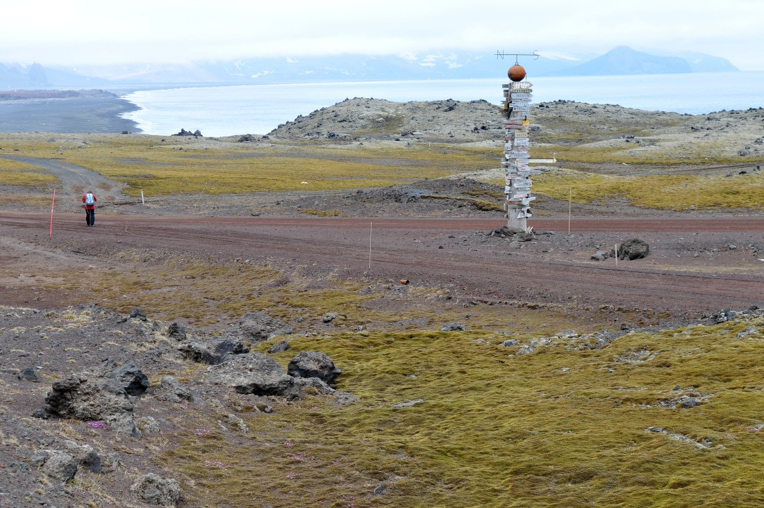 Traditional signpost with directions to the civil world.JPG