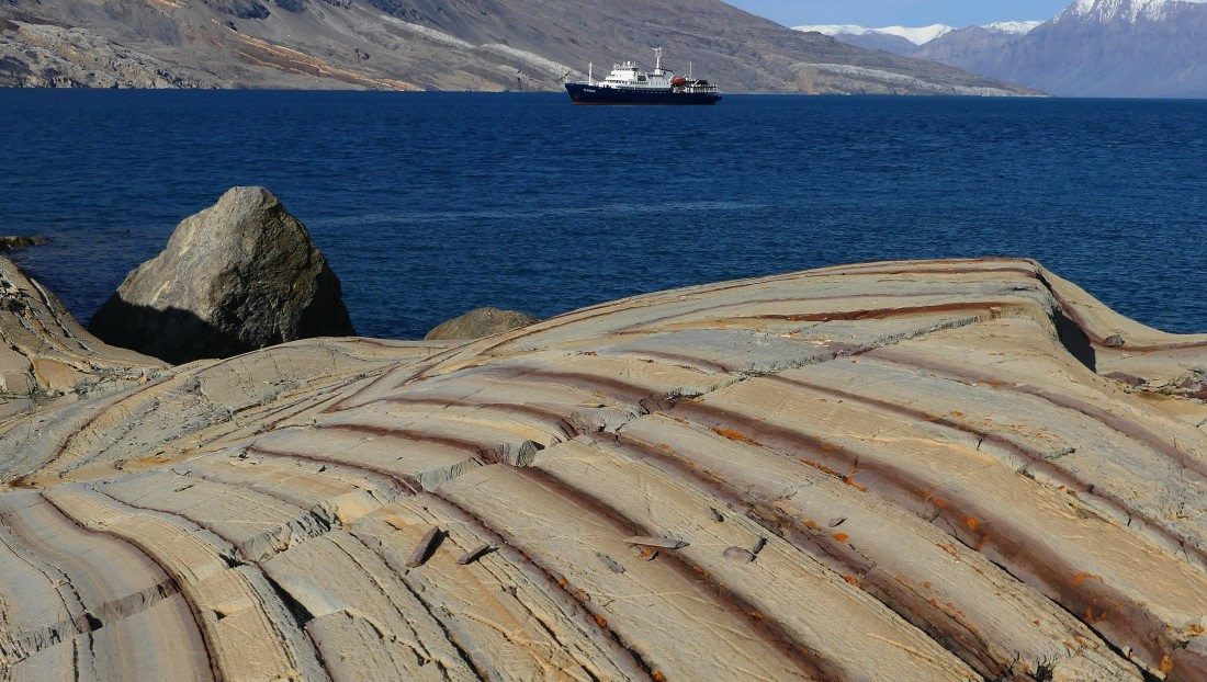 PLA11-24, Day 8,  Stripey yellow rocks with Plancius 16 x 9 © John Rogers - Oceanwide Expeditions.JPG