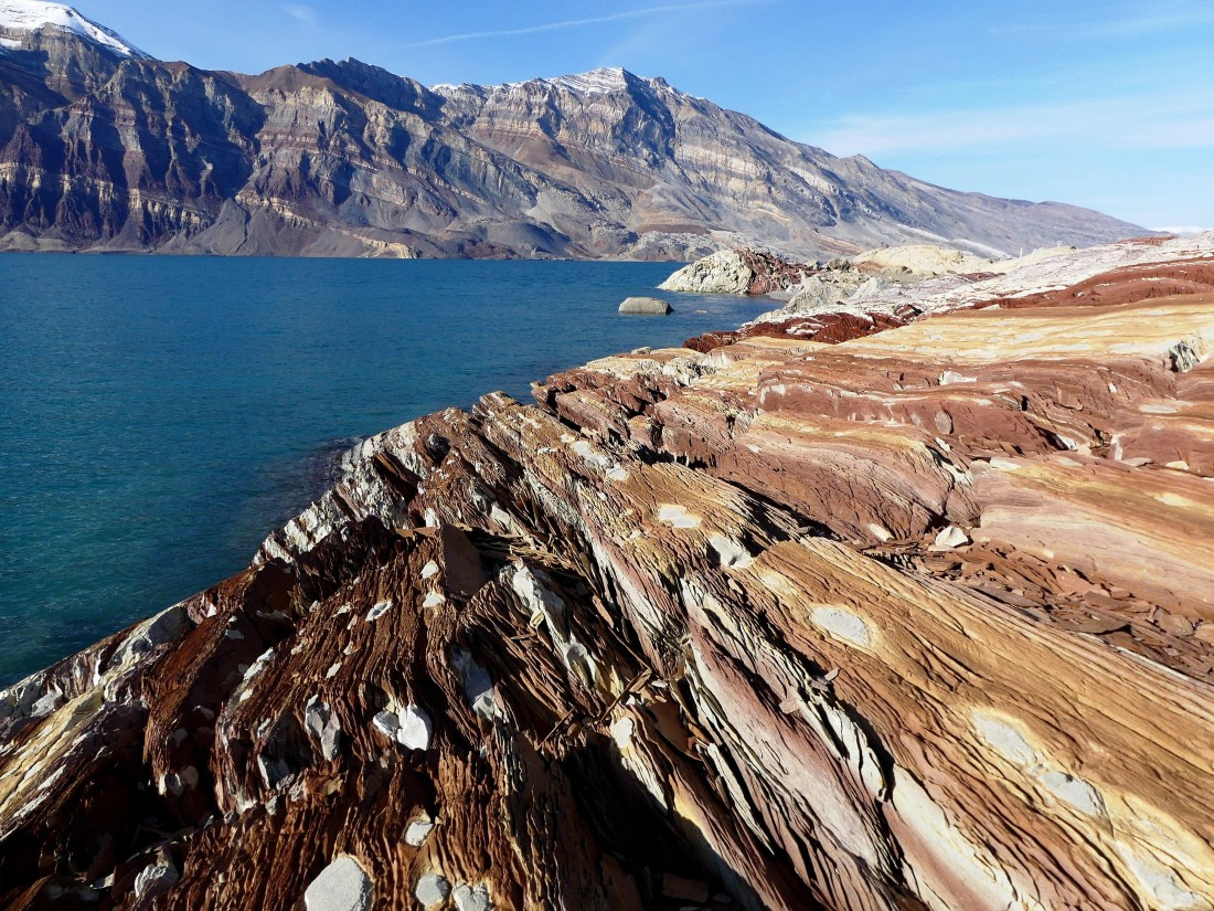 PLA11-24, Day 8, Dotted rocks with fjord 1 © John Rogers - Oceanwide Expeditions.JPG
