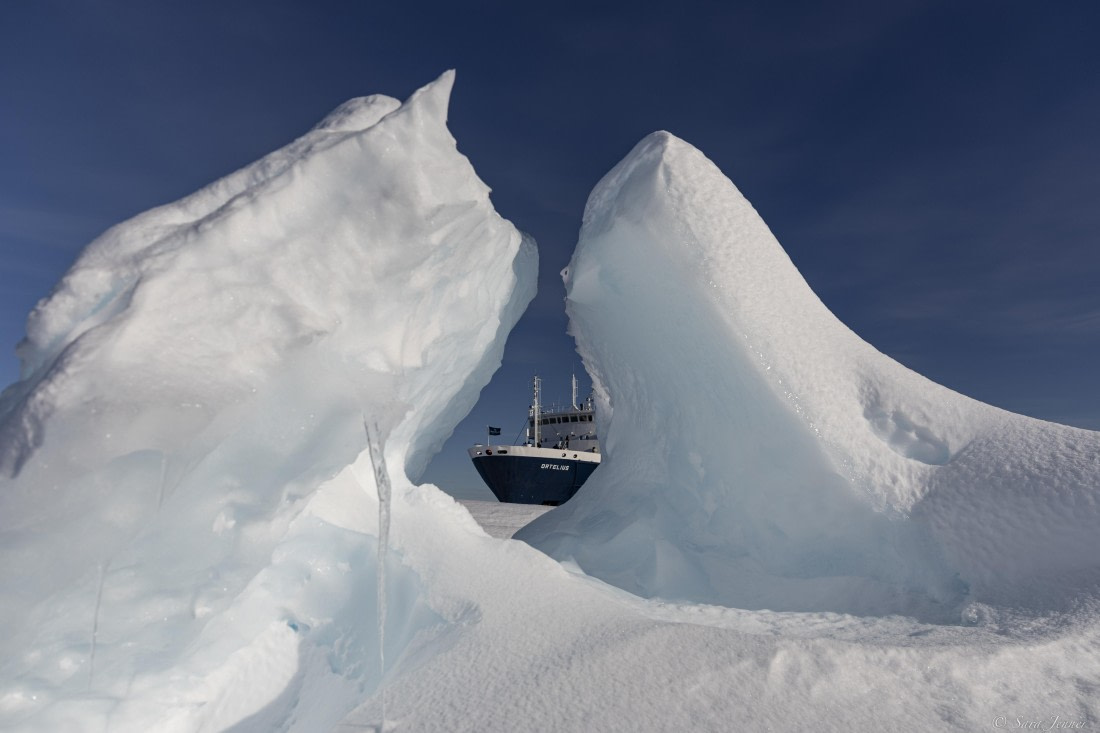 OTL30-25, Day 16, Ortelius framed by ice © Sara Jenner - Oceanwide Expeditions.jpg