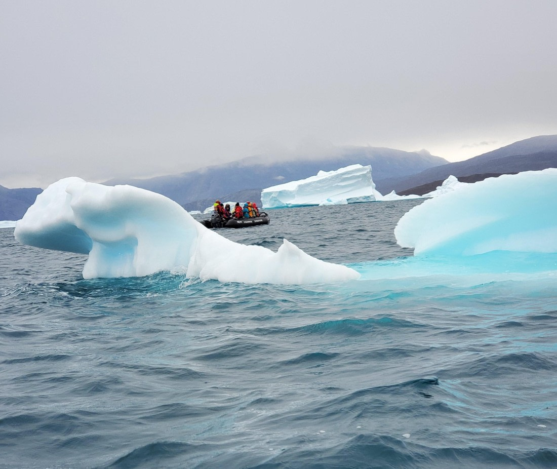 Zodiac among the icebergs
