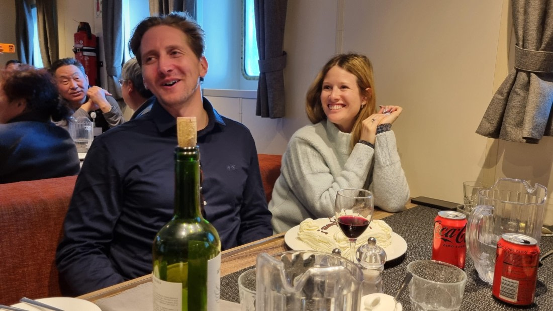 OTL22-25, Day 8, 18Nov2025-Gary Miller-Engaged Couple with cake.jpg © Gary Miller - Oceanwide Expeditions.jpg