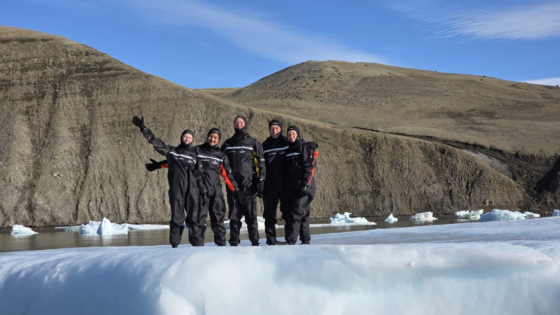 OTL31a26, Day 5, Snorkellers on ice 20260321_103418.jpg © Sid Dewfall - Oceanwide Expeditions.jpg