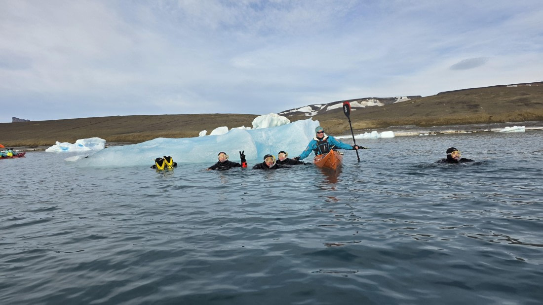 OTL31a26, Day 7, Kayak and snorkellers around berg 20260323_101656.jpg © Sid Dewfall - Oceanwide Expeditions.jpg