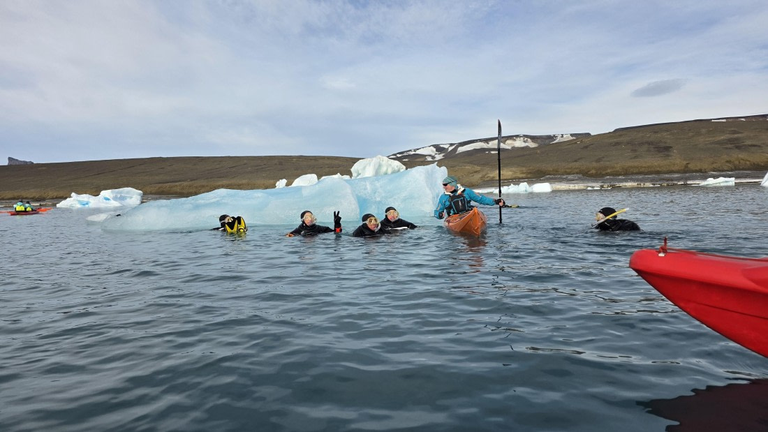 OTL31a26, Day 7, Kayak and snorkellers around berg 20260323_101658.jpg © Sid Dewfall - Oceanwide Expeditions.jpg