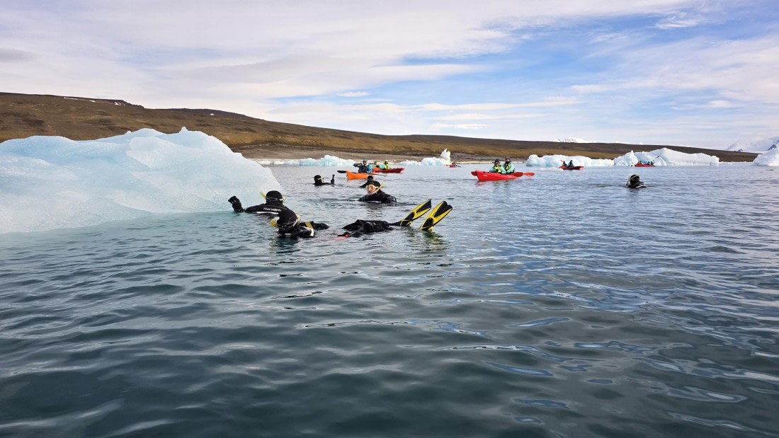 OTL31a26, Day 7, Kayak and snorkellers around berg20260323_101512.jpg © Sid Dewfall - Oceanwide Expeditions.jpg