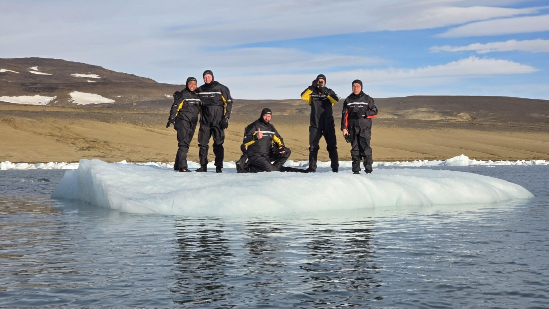 OTL31a26, Day 7, Snorkellers on iceberg 20260323_094735.jpg © Sid Dewfall - Oceanwide Expeditions.jpg