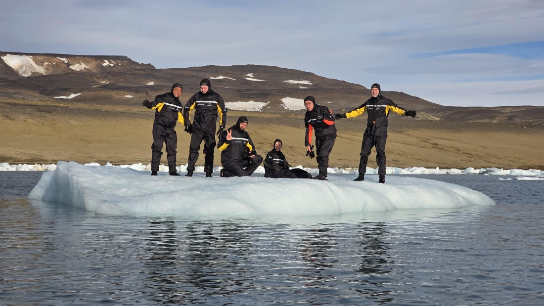 OTL31a26, Day 7, Snorkellers on iceberg 20260323_094752.jpg © Sid Dewfall - Oceanwide Expeditions.jpg