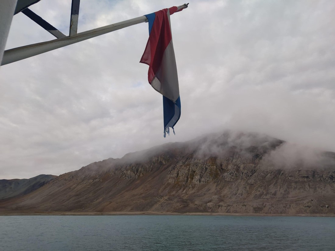 OTL13-26, Day 8, Flag Netherlands approach Hornsund.jpeg © Unknown Photographer - Oceanwide Expeditions.jpeg