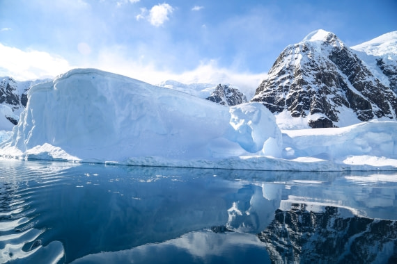 Mirrored moutain and iceberg