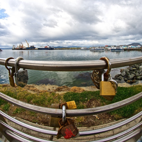 "love locks" at Ushuaia pier, Ortelius in background