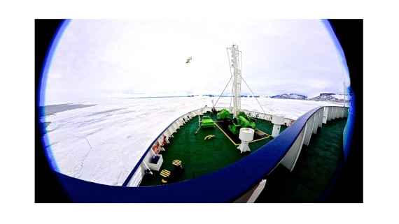M/V Ortelius anchored on pack ice during helicopter operations, weddell sea, dec 2016