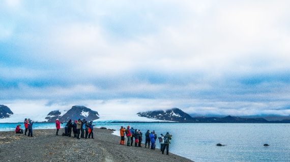 Jordi/expedition leader w/rifle queueing up everyone a safe distance to observe walrus, spitbergen - NE greenland 2017