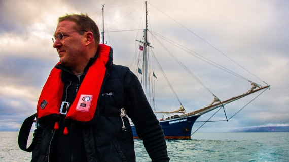 Captain Joachim/Rembrandt van Rijn piloting zodiac to sarstangen to view walrus