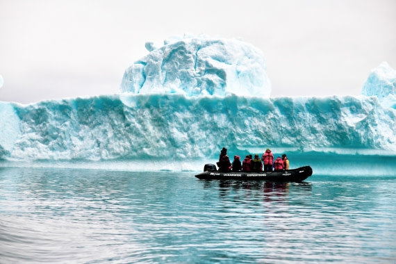 Zodiac cruising, blue iceberg, Greenland © Calvin Sun - Oceanwide Expeditions.jpg