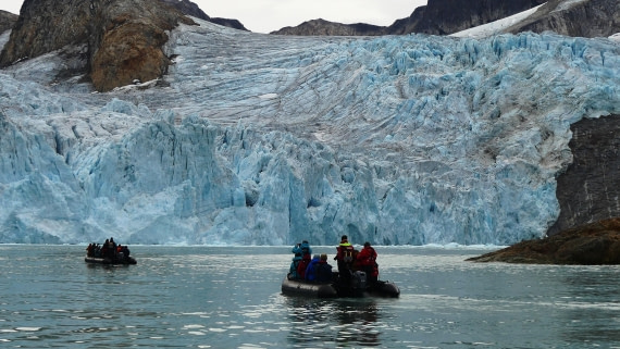 PLA11-24, Day 2,  Zodiacs with glacier 16 x 9 © John Rogers - Oceanwide Expeditions.JPG