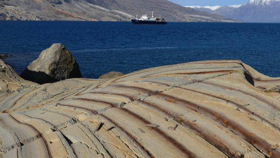 PLA11-24, Day 8,  Stripey yellow rocks with Plancius 16 x 9 © John Rogers - Oceanwide Expeditions.JPG