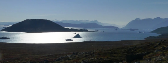 PLA11-24, Day 11,  Sydcap sea with bergs ship sun © Unknown photographer - Oceanwide Expeditions.JPG
