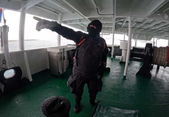 OTL23-24, Day 4, Snorkelers in drysuit Rick © Unknown photographer - Oceanwide Expeditions.JPG