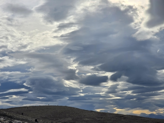 OTL09-25, Day 9, Ymerbukta_clouds © Unknown photographer - Oceanwide Expeditions.jpg