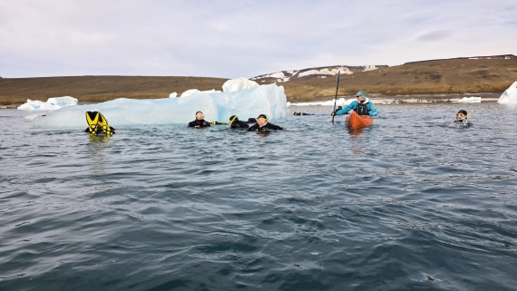 OTL31a26, Day 7, Kayak and snorkellers around berg 20260323_101643.jpg © Sid Dewfall - Oceanwide Expeditions.jpg