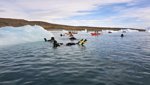 OTL31a26, Day 7, Kayak and snorkellers around berg20260323_101512.jpg © Sid Dewfall - Oceanwide Expeditions.jpg