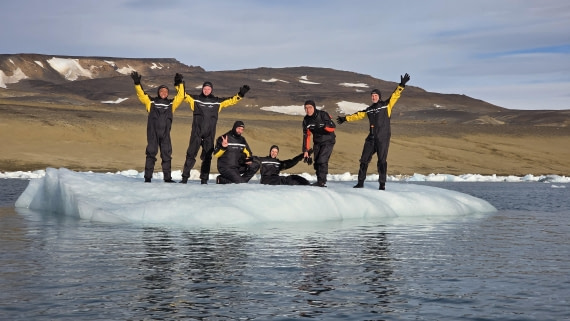OTL31a26, Day 7, Snorkellers on iceberg 20260323_094757.jpg © Sid Dewfall - Oceanwide Expeditions.jpg