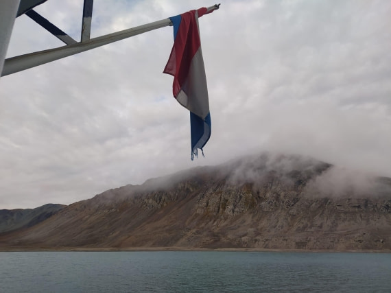 OTL13-26, Day 8, Flag Netherlands approach Hornsund.jpeg © Unknown Photographer - Oceanwide Expeditions.jpeg